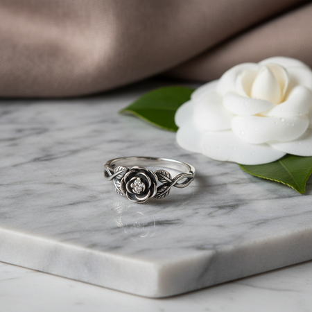 Sterling Silver Floral Ring on marble background